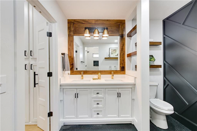 Double vanity bathroom with wood accents