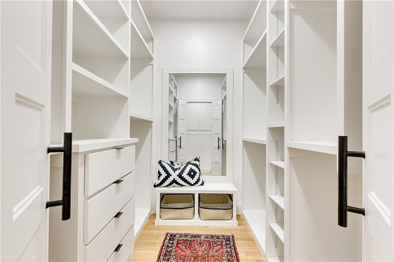 Walk in closet with built-in storage system