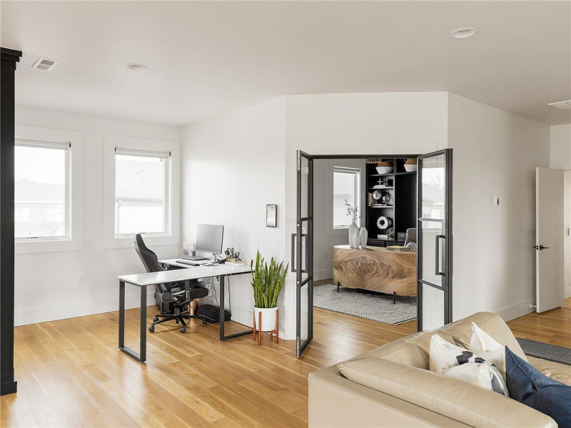 Double glass doors leading into office or den