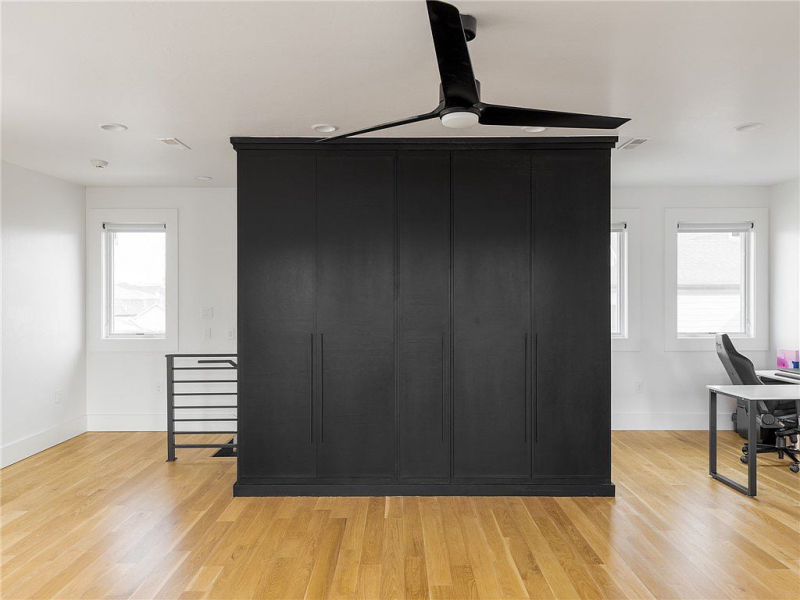 Black accent wall in loft or gameroom