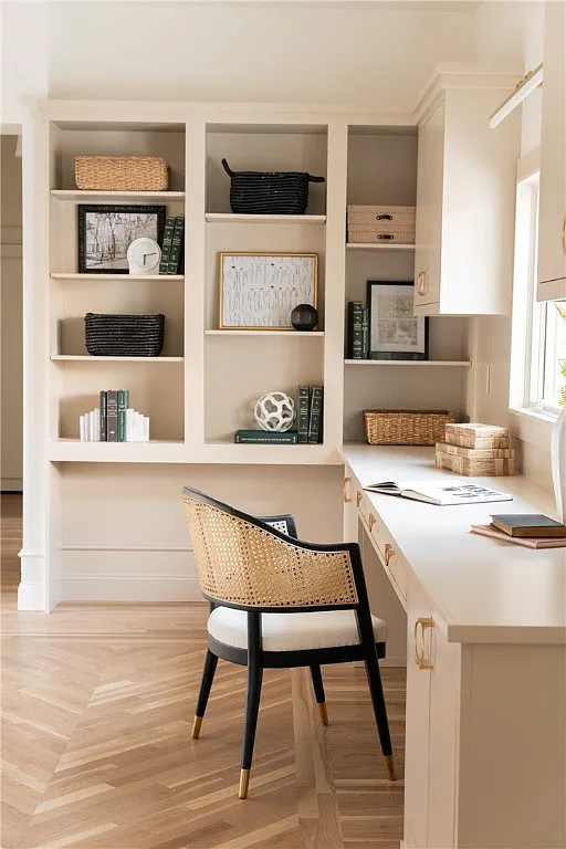 Office or den area with built-in bookshelves